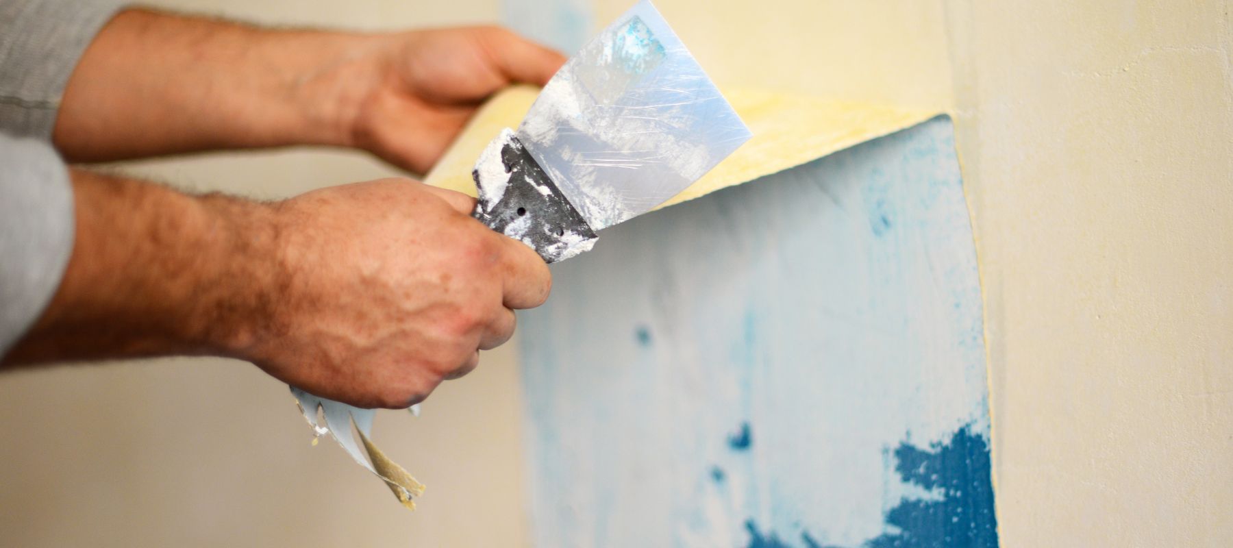 close up of wallpaper removal