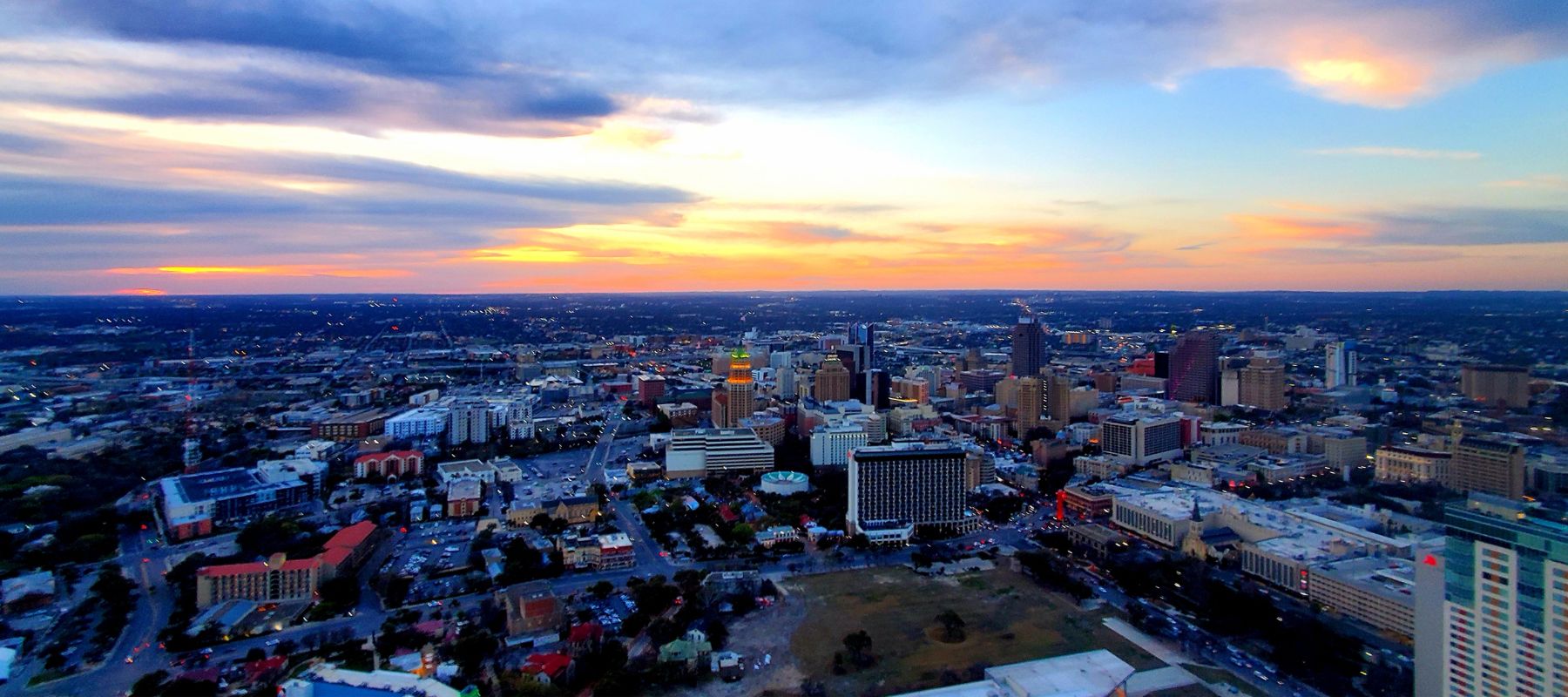 wide aerial view of hollywood park at sunset