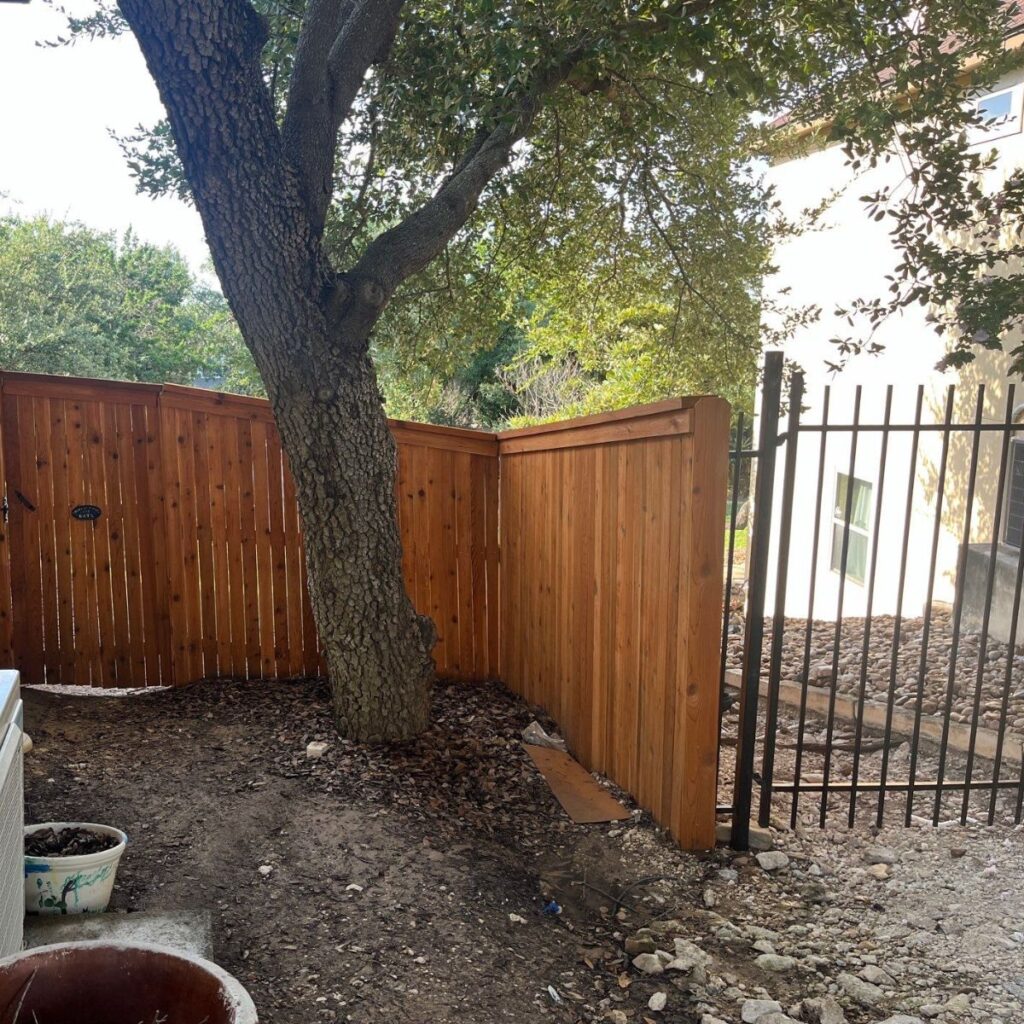 wooden fence repaired at a home in san antonio, texas