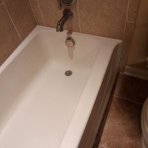 bath tub caulking at a home in 78023