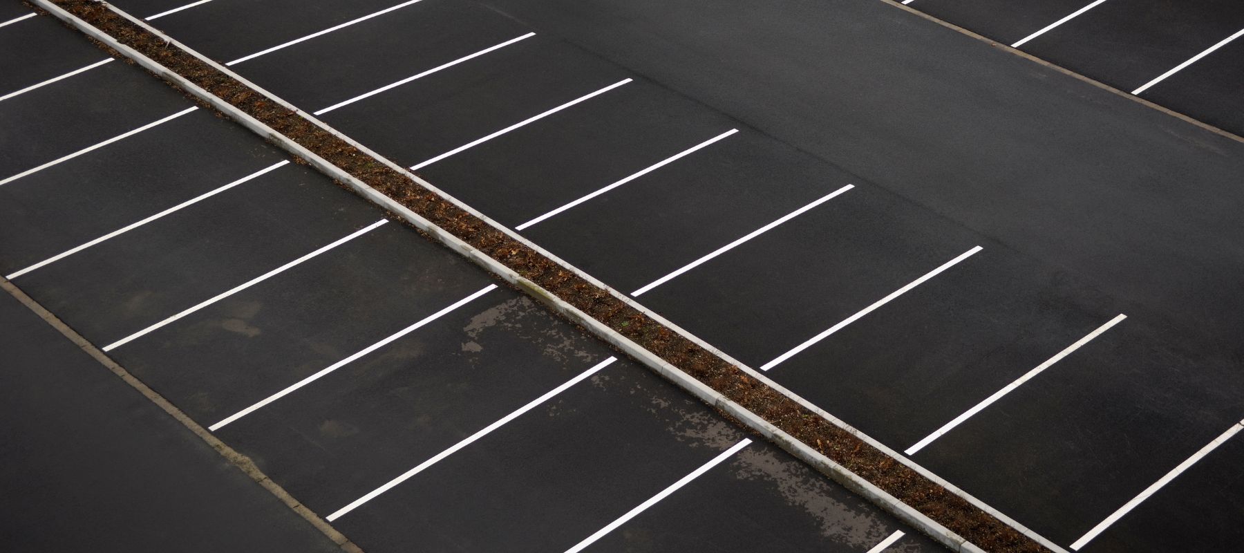 aerial shot of a well kept parking lot with fresh stripes